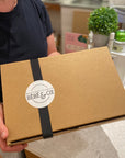 Coffret cadeau personnalisé de la Boutique Planète Bébé Accessoires Être par La Boutique Planète Bébé et Cie.